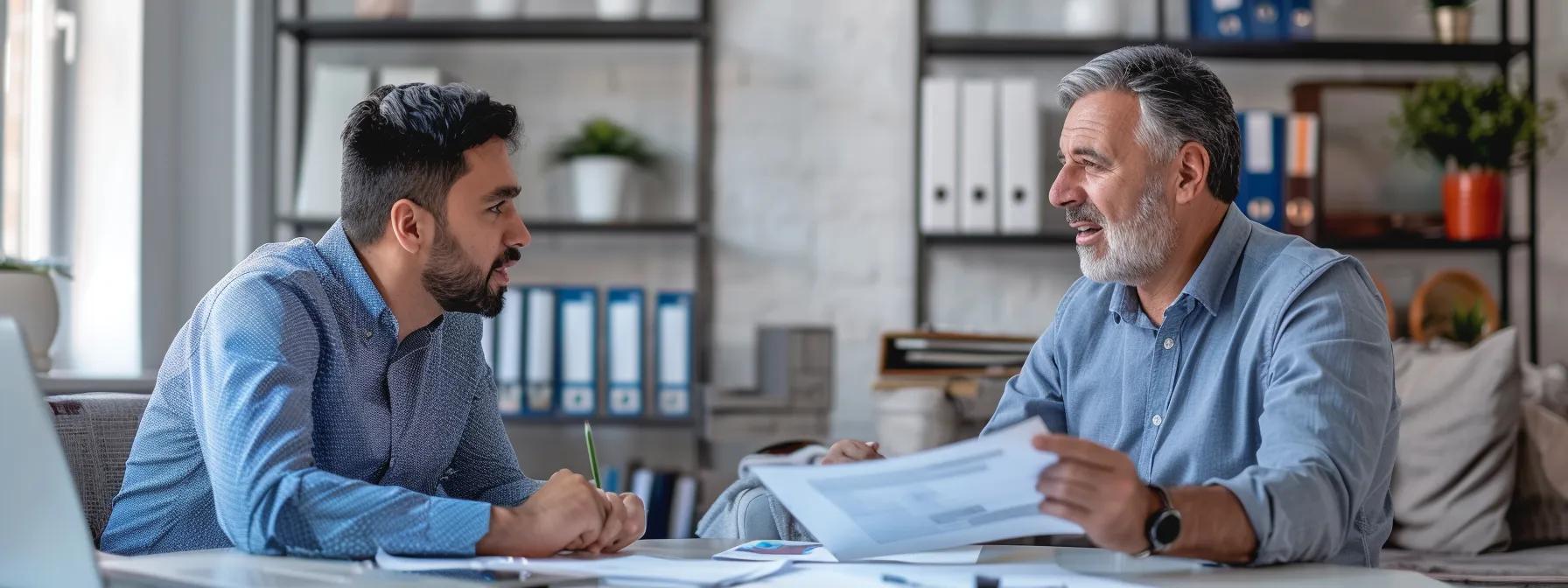 Homeowner discussing insurance claims for emergency roof replacement with an agent in a home office